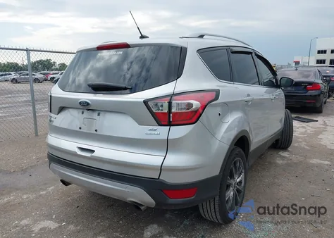 2017 Ford Escape Titanium from USA, damaged, VIN 1FMCU0J95HUE94399